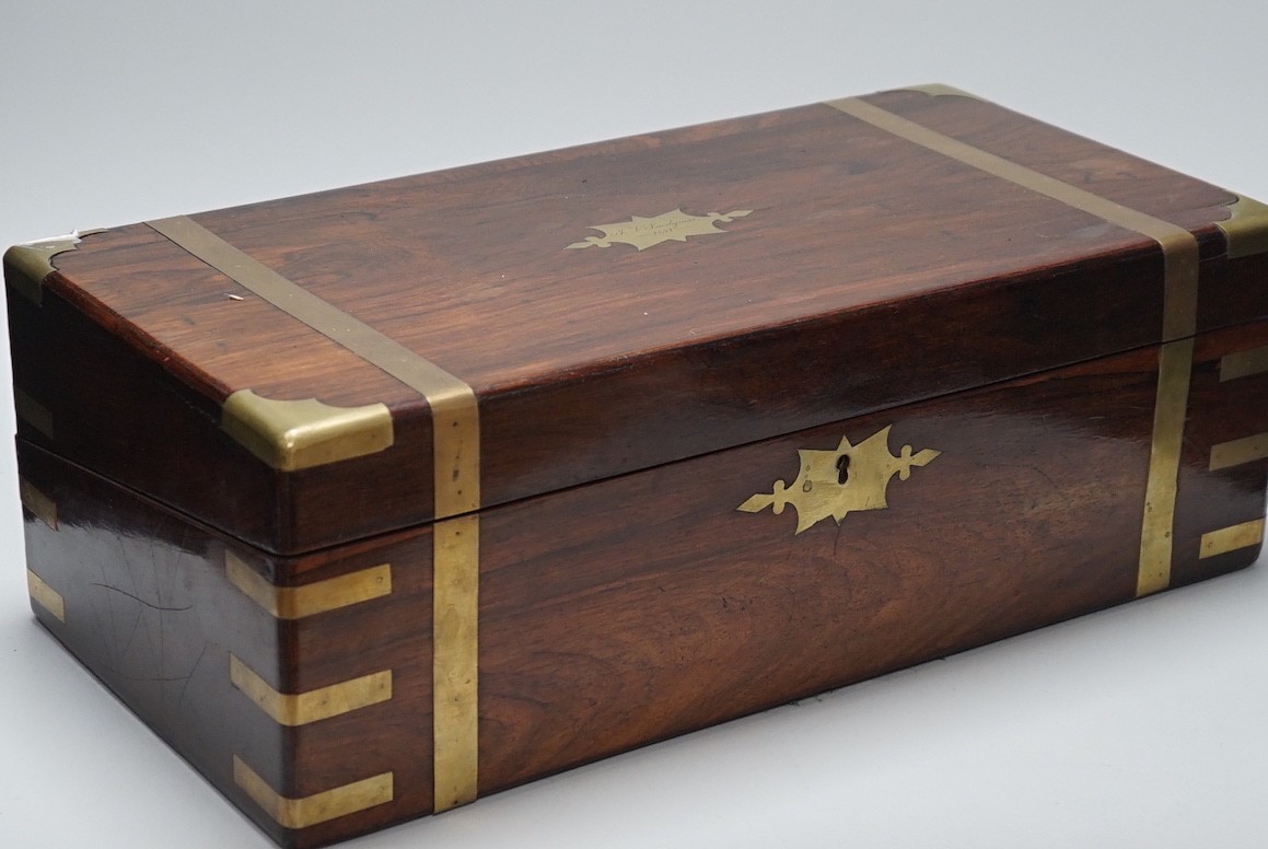 A 19th century brass bound rosewood writing slope, engraved inset to lid. 50cm wide